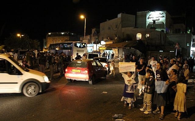 Jewish residents of Ras al-Amoud call for better police protection during a demonstration Saturday, Nov. 3 (photo credit: Yishai Fleisher) Jewish residents of Ras al-Amoud call for better police protection during a demonstration Saturday, Nov. 3 (photo credit: Yishai Fleisher)