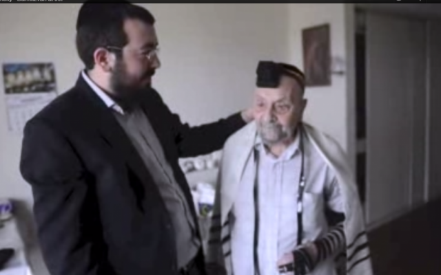 Rabbi Eli Schlanger and Isaac Volinsky (photo credit: YouTube screen capture)