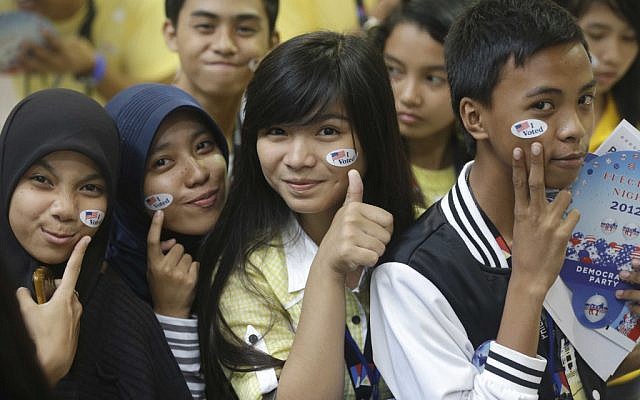 Muslim students pose before a throng of photographers shortly after "voting" in the mock US election at a shopping mall at suburban Quezon city, northeast of Manila, Philippines Wednesday, Nov. 7 (photo credit: AP/Bullit Marquez) Muslim students pose before a throng of photographers shortly after "voting" in the mock US election at a shopping mall at suburban Quezon city, northeast of Manila, Philippines Wednesday, Nov. 7 (photo credit: AP/Bullit Marquez)