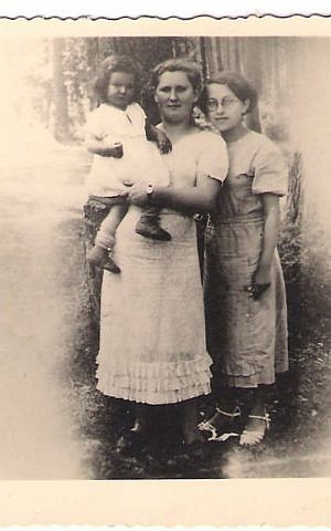Shoshana Golan's mother, Sara Beiman, holds her daughter just before entrusting her with the Dudziak family. Sara presumably died in Majdanek. (Jewish Foundation for the Righteous via JTA)