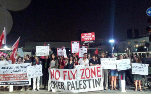 Rallying against Pillar of Defense in Tel Aviv. (photo credit: Yuval Ben-Ami)