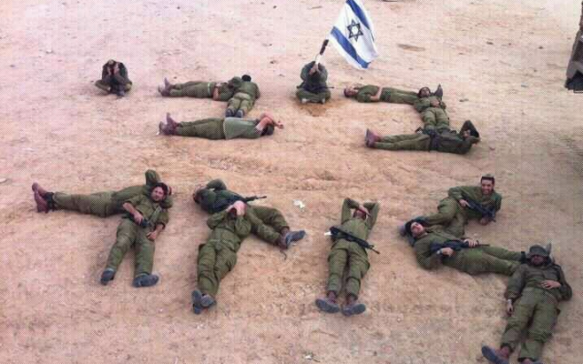 IDF soldiers using their bodies to spell 'Bibi [is a] loser,' November 22, 2012. (photo credit: screen capture/Facebook)