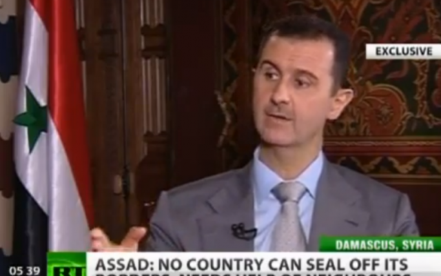 Syrian President Bashar Assad in an interview with Russia Today in 2012 (file photo credit: screenshot from YouTube, Russia Today) Syrian President Bashar Assad in an interview with Russia Today in 2012 (file photo credit: screenshot from YouTube, Russia Today)
