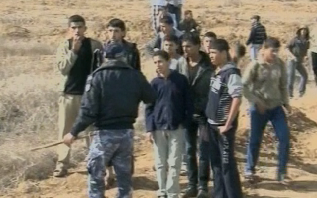 Hamas security forces stationed along the Israeli-Gaza border on Saturday. (photo credit: image capture from Channel 2)