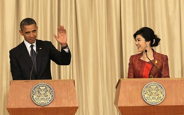 US President Barack Obama, left, and Thai Prime Minister Yingluck Shinawatra hold a joint press conference at the Government House in Bangkok, Thailand, Sunday, Nov. 18, 2012. (photo credit: Sakchai Lalit/AP)