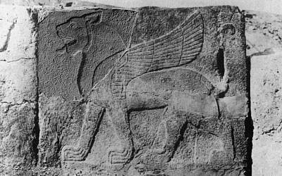 This image made available by the Joint Turco-Italian Archaeological Expedition shows a file photo of a reconstruction of the lion head fragment set into the slab now in the Anatolian Civilizations Museum in Ankara, Turkey (photo credit: AP Photo/Joint Turco-Italian Archaeological Expedition, File)