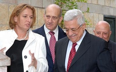 From left: then-foreign minister Tzipi Livni, then-prime minister Ehud Olmert, Palestinian Authority President Mahmoud Abbas and Palestinian negotiator Ahmed Qurei, during a meeting in Jerusalem in November, 2007 (photo credit: Moshe Milner/GPO/Flash90)