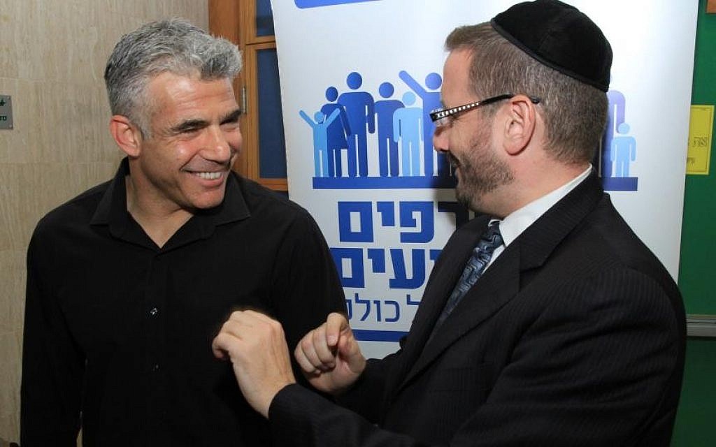 Dov Lipman, right, and Yesh Atid chairman Yair Lapid (photo credit: Yaakov Lederman) Dov Lipman, right, and Yesh Atid chairman Yair Lapid (photo credit: Yaakov Lederman)