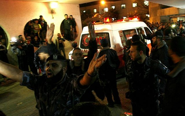 Palestinians in the al-Shifa hospital in Gaza City following an Israeli air strike on November 14, 2012 (photo credit: Abd Rahim Khatib/Flash90)