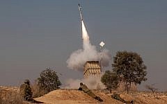 A volley of rockets fired from the Gaza Strip was intercepted by the Iron Dome missile defense system near the city of Beersheba, November 15 (photo credit: Uri Lenzl/Flash90)