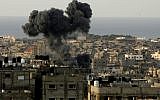 Smoke billows from the site of an Israeli airstrike in the southern Gaza Strip on November 16, 2012. (photo credit: Abed Rahim Khatib/Flash 90)