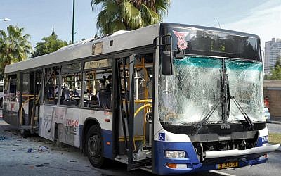 The scene of the November 21 bus bombing in Tel Aviv (photo credit: Moshe Milner/GPO/Flash90)