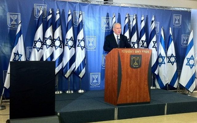 Prime Minister Benjamin Netanyahu speaks to reporters on Thursday. (photo credit: Yoel Goldman/Times of Israel Staff)