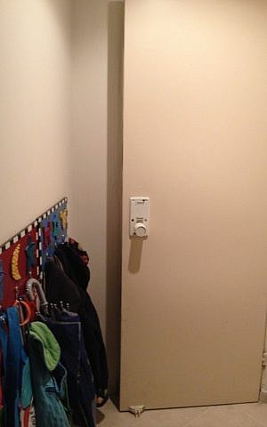 A look at the reinforced steel door of the safe room (photo credit: Jessica Steinberg/Times of Israel)