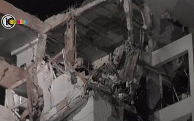 A building in Rishon that sustained heavy damage from a rocket attack on Tuesday (photo credit: Channel 10 screen capture) A building in Rishon that sustained heavy damage from a rocket attack on Tuesday (photo credit: Channel 10 screen capture)
