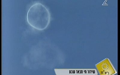 A smoke ring in the sky above Beersheba, following a successful interception by Iron Dome (screen capture: Channel 2 News)