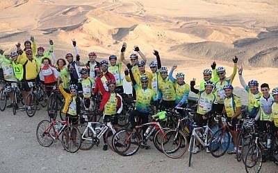 Participants of the 2012 Wheels of Love ride pose for a group picture (photo credit: courtesy ALYN)