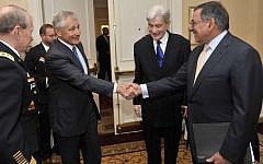Former senator Chuck Hagel (left) shakes hands with Secretary of Defense Leon E. Panetta in May 2012. (photo credit: CC BY Glenn Fawcett, DoD, Flickr)