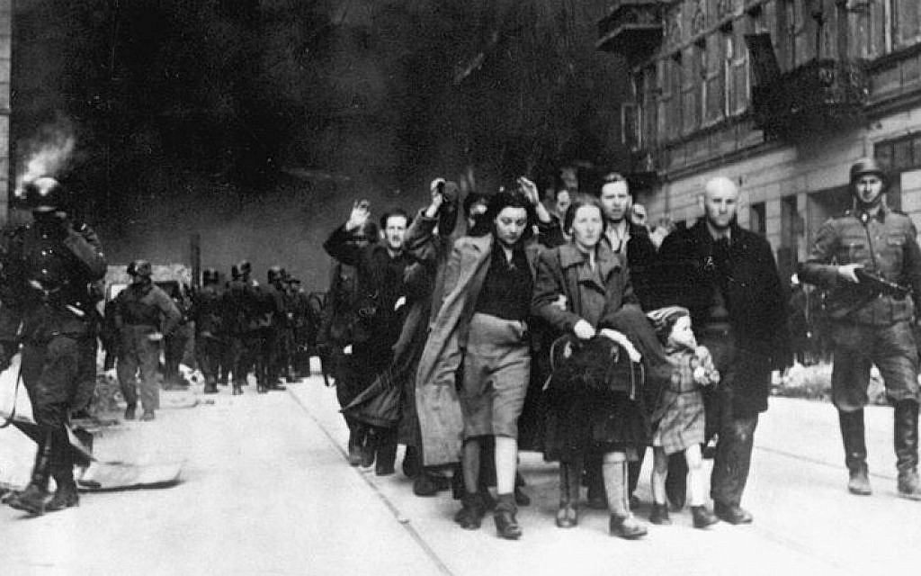 Jews in the Warsaw Ghetto are led by German soldiers to an assembly point for deportation to death camps, 1943. (Public domain) Jews in the Warsaw Ghetto are led by German soldiers to an assembly point for deportation to death camps, 1943. (Public domain)