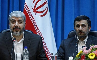 Palestinian Hamas leader Khaled Mashaal, left, speaks, as Iranian President Mahmoud Ahmadinejad, listens during the International Conference on National and Islamic Unification of Palestine Future in Tehran, Iran, Sunday, Feb. 28, 2010 (Vahid Salemi/AP)