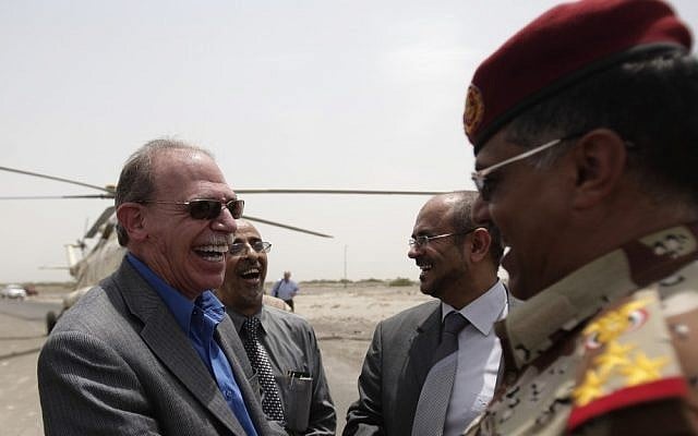 US Ambassador to Yemen Gerald M. Feierstein, left, shakes hands with a Yemeni army officer during a visit to Abyan, Yemen. Al-Qaida's branch in Yemen has offered to pay tens of thousands of dollars to anyone who kills Feierstein or an American soldier in the country, according to an audio produced by the group's media arm, the al-Malahem Foundation, and posted on militant websites Saturday, December 29, 2012. (photo credit: AP/Hani Mohammed, File) US Ambassador to Yemen Gerald M. Feierstein, left, shakes hands with a Yemeni army officer during a visit to Abyan, Yemen. Al-Qaida's branch in Yemen has offered to pay tens of thousands of dollars to anyone who kills Feierstein or an American soldier in the country, according to an audio produced by the group's media arm, the al-Malahem Foundation, and posted on militant websites Saturday, December 29, 2012. (photo credit: AP/Hani Mohammed, File)