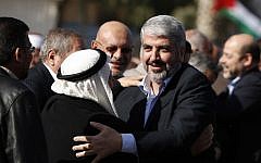 Exiled Hamas chief Khaled Mashaal upon his arrival at Rafah crossing in the southern Gaza Strip, Friday, Dec. 7, 2012 (photo credit: AP/Sohaib Salem)