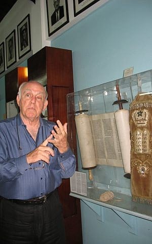 Like many of Jamaica's roughly 200 Jews, Ainsley Henriques, pictured at the Jewish Heritage Center in Kingston, traces his background to Sephardic immigrants. (Debra Rubin/JTA)