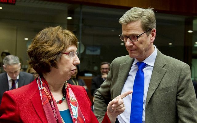 EU High Representative Catherine Ashton, left, speaks with German Foreign Minister Guido Westerwelle during a meeting of EU foreign ministers at the EU Council building in Brussels on Monday, Dec. 10 (photocredit: AP/Virginia Mayo) EU High Representative Catherine Ashton, left, speaks with German Foreign Minister Guido Westerwelle during a meeting of EU foreign ministers at the EU Council building in Brussels on Monday, Dec. 10 (photocredit: AP/Virginia Mayo)
