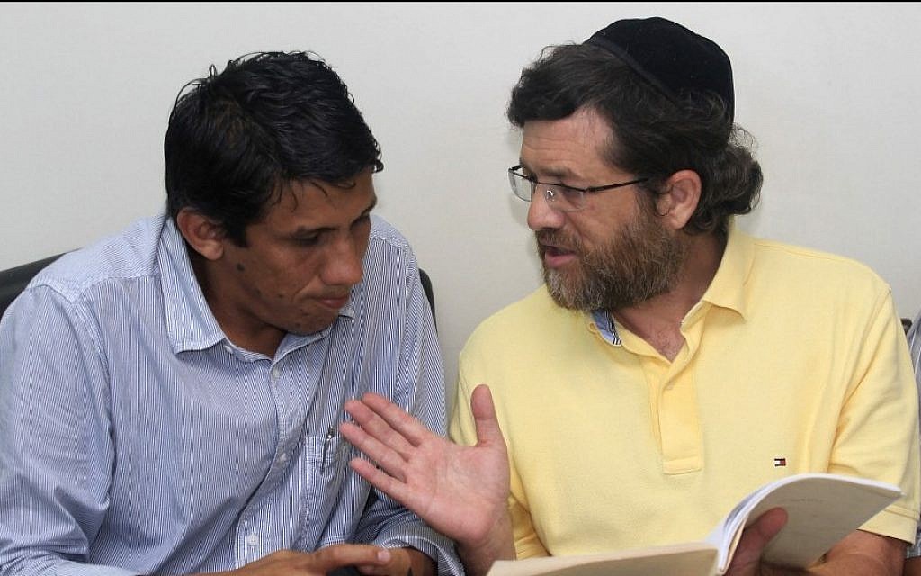 New York businessman Jacob Ostreicher, right, consults with attorney Abel Montano at a courthouse in Bolivia, where he was being held without charges (photo credit: AP/File) New York businessman Jacob Ostreicher, right, consults with attorney Abel Montano at a courthouse in Bolivia, where he was being held without charges (photo credit: AP/File)