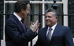 Britain's Prime Minister David Cameron, left, greets King Abdullah II of Jordan at Downing Street in London, Tuesday, Dec. 11, 2012. (photo credit: AP/Kirsty Wigglesworth)