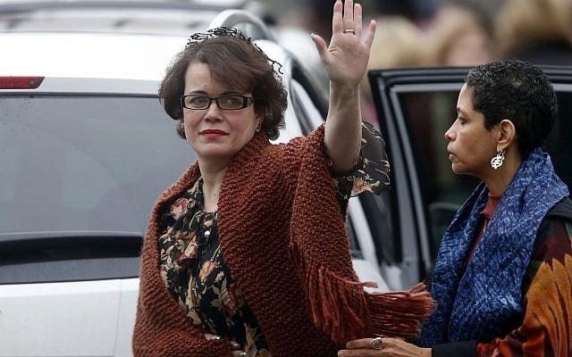 Veronique Pozner (De La Rosa) waves to the assembled press as she leaves after a funeral service for her son, 6-year-old Noah Pozner in Fairfield, Conn in December. The tree planting drive grew out of a request Pozner made in memory of her son. (photo credit: AP/Jason DeCrow) Veronique Pozner (De La Rosa) waves to the assembled press as she leaves after a funeral service for her son, 6-year-old Noah Pozner in Fairfield, Conn in December. The tree planting drive grew out of a request Pozner made in memory of her son. (photo credit: AP/Jason DeCrow)