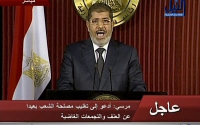 Egyptian President Mohammed Morsi delivers a televised statement in Cairo, Egypt, Thursday, December 6, 2012. (photo credit: AP/Nile TV)