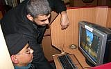 Illustrative: Palestinian youth in an Internet cafe in Gaza, March 2007 (photo credit: Ahmad Khatib/Flash90)