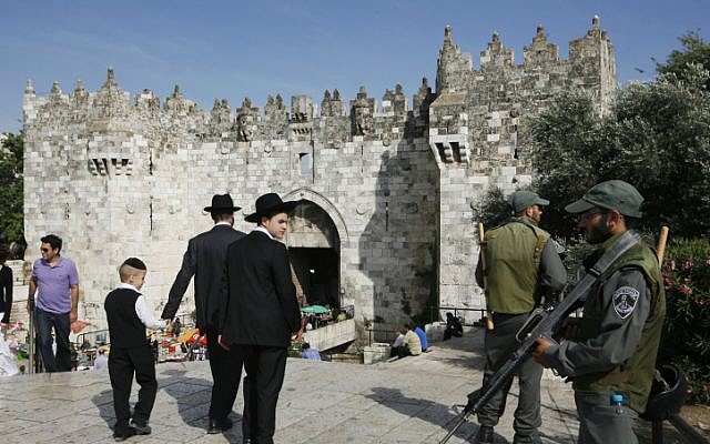 Ultra-Orthodox Jews walk toward Damascus Gate in Jerusalem's Old City, May 2010. (photo credit: Miriam Alster/Flash90)