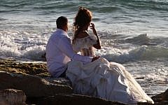 Illustrative photo of a couple posing for pictures before their wedding. (Kobi Gideon/Flash90)