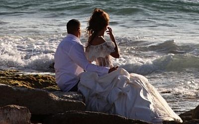 Illustrative photo of a couple posing for pictures before their wedding. (Kobi Gideon/Flash90)