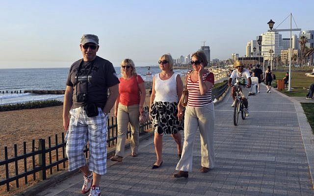 Tourists take a stroll on the Tel Aviv promenade (photo credit: Serge Attal/Flash90) Tourists take a stroll on the Tel Aviv promenade (photo credit: Serge Attal/Flash90)
