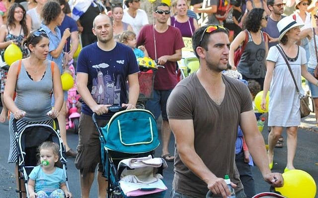 Participants in a protest against the high costs of raising young children, in Tel Aviv in 2011. (photo credit: Yossi Zeligerf/Flash90) Participants in a protest against the high costs of raising young children, in Tel Aviv in 2011. (photo credit: Yossi Zeligerf/Flash90)