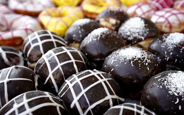 Fresh sufganiyot at the ready (photo credit: Miriam Alster/Flash 90)