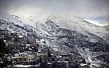 A view of a snow-clad Mount Hermon as seen from the village of Majdal Shams on January 12, 2012 (photo credit: Matanya Tausig/Flash90)
