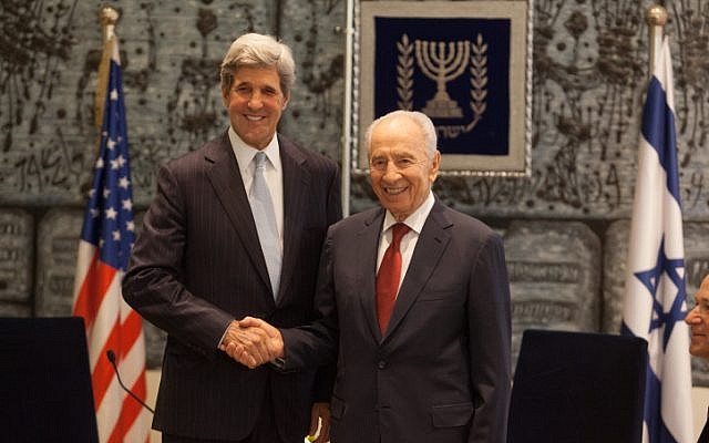 President Shimon Peres meets with US Senator John Kerry at the President's Residence in Jerusalem in May 2012 (photo credit: Uri Lenz/Flash90)