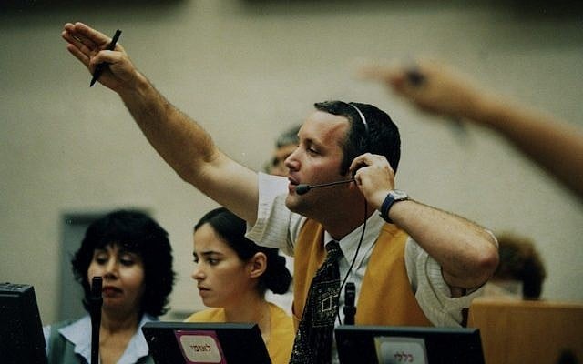 A broker at the Tel Aviv Stock Exchange (photo credit: Moshe Shai/Flash90)