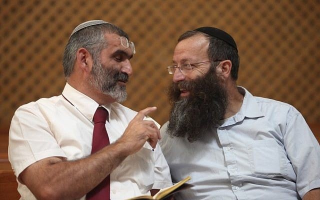 File: Baruch Marzel speaks with MK Michael Ben-Ari, Sep 6 2012. (Yoav Ari Dudkevitch/Flash90)