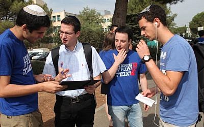 Students affiliated with the Labor Party try to recruit supporters at The Hebrew University (photo credit: Yoav Ari Dudkevitch/Flash90)