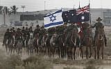 Australian men and women reenacting the last cavalry charge that took place in the Battle of Beersheba during World War I. (Tsafrir Abayov/Flash90)