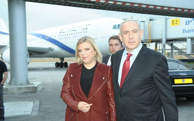 Prime Minister Benjamin Netanyahu and his wife Sara make their way to Prague on Wednesday, December 5. (photo credit: Amos Ben Gershom/GPO/Flash90) Prime Minister Benjamin Netanyahu and his wife Sara make their way to Prague on Wednesday, December 5. (photo credit: Amos Ben Gershom/GPO/Flash90)