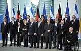 Israeli and German ministers posing in Berlin Thursday. (photo credit: Amos Ben Gershom/GPO/Flash90)