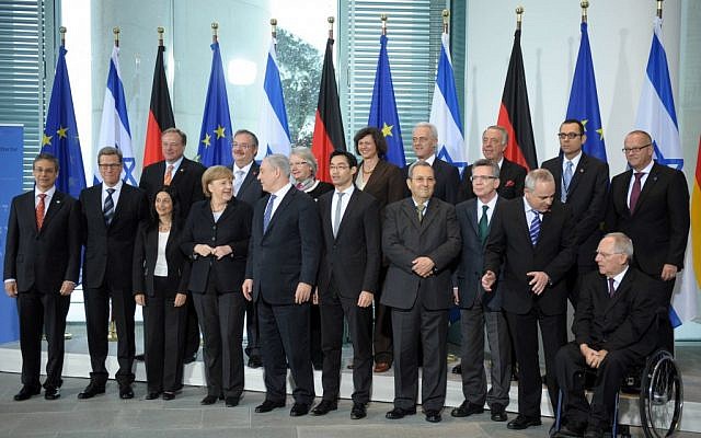 Israeli and German ministers posing in Berlin Thursday. (photo credit: Amos Ben Gershom/GPO/Flash90)