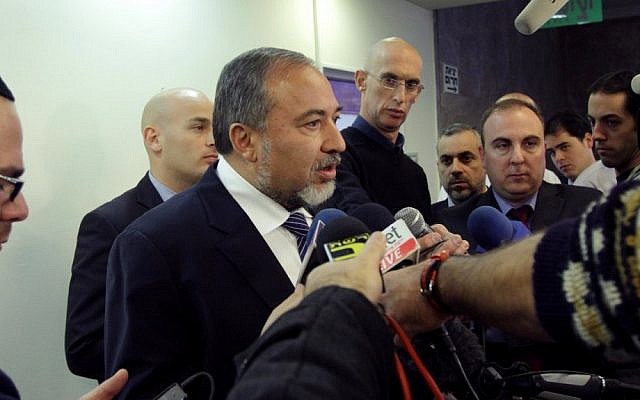 Foreign Minister Avigdor Liberman speaks to reporters as he arrives at the weekly Cabinet meeting at the Prime Minister's Office in Jerusalem on Sunday (photo credit: Alex Kolomoisky/Flash90) Foreign Minister Avigdor Liberman speaks to reporters as he arrives at the weekly Cabinet meeting at the Prime Minister's Office in Jerusalem on Sunday (photo credit: Alex Kolomoisky/Flash90)
