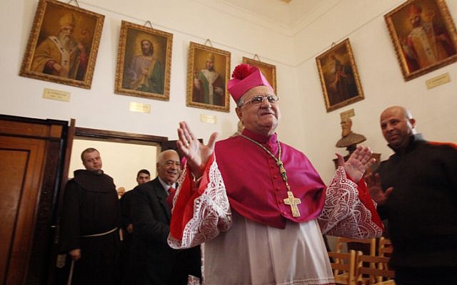 Latin Patriarch Fouad Twal speaks at the Latin Patriarchate of Jerusalem, on December 24 (photo credit: Miriam Alster/Flash90)